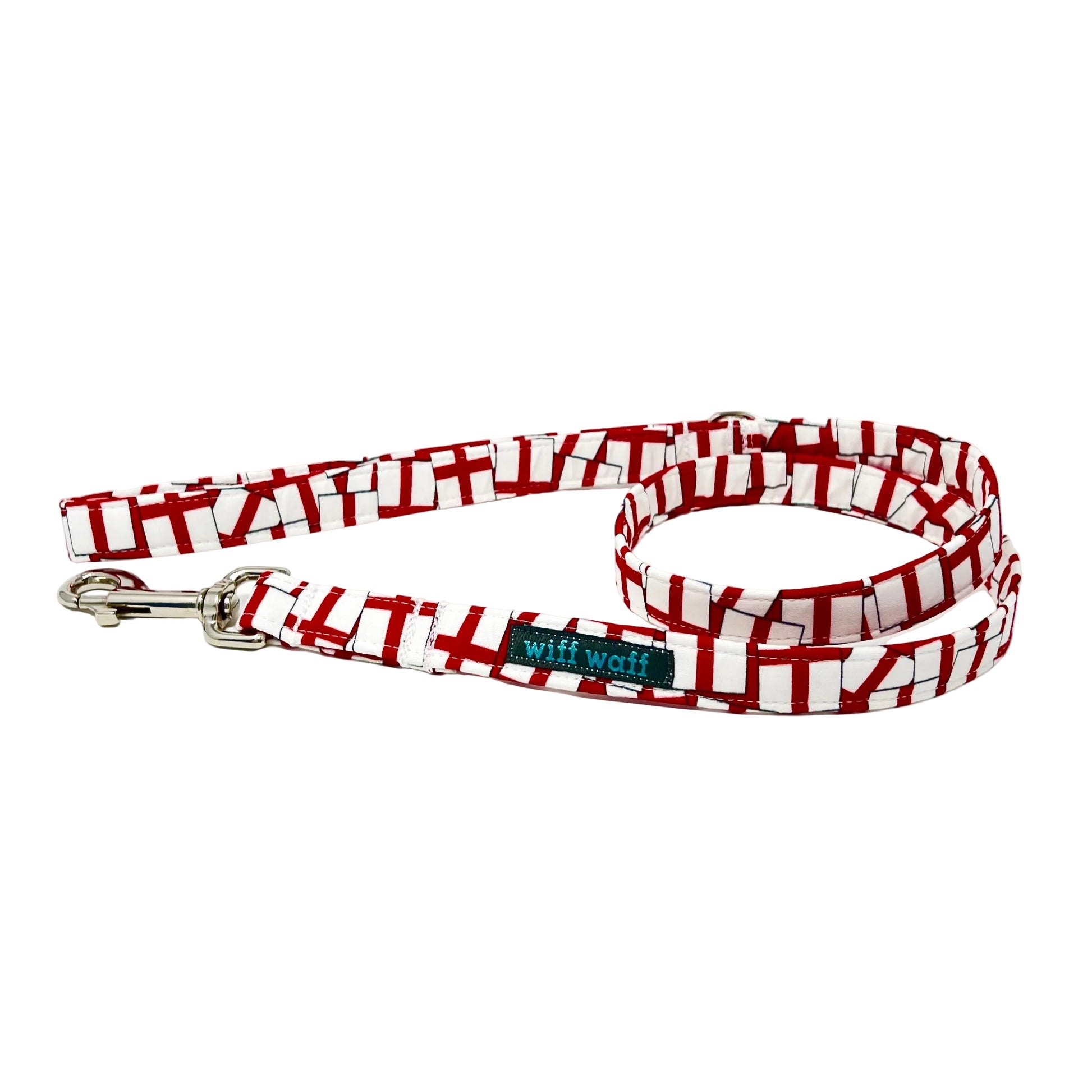 Red and white St Georges Flag dog lead with a visible brand tag on a white background