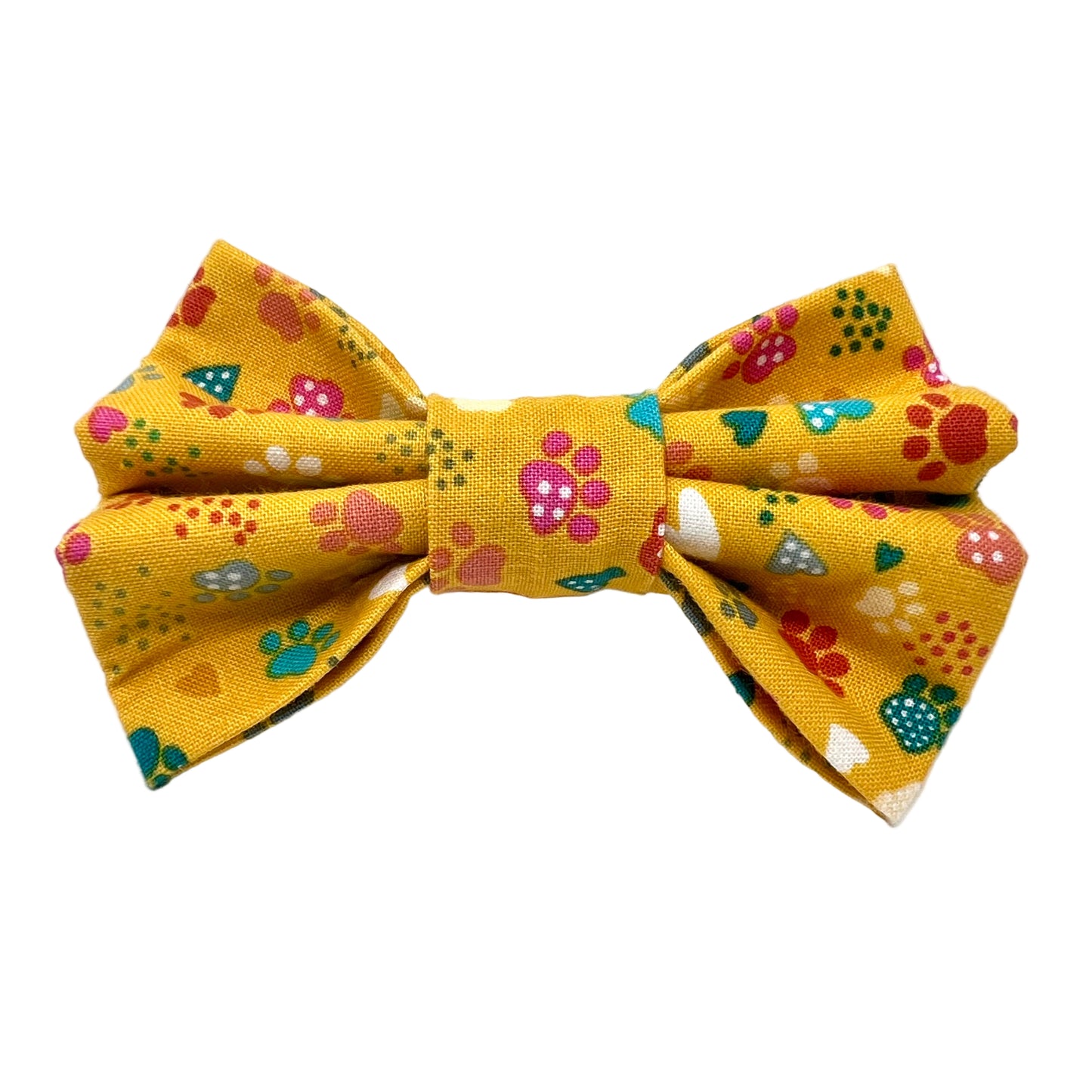 Yellow bow tie with colourful paw patterns on a white background