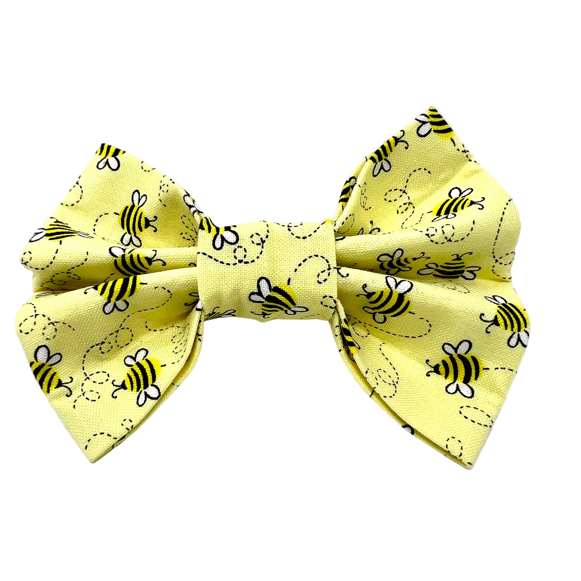 Pale yellow bow tie with bee pattern all over it.