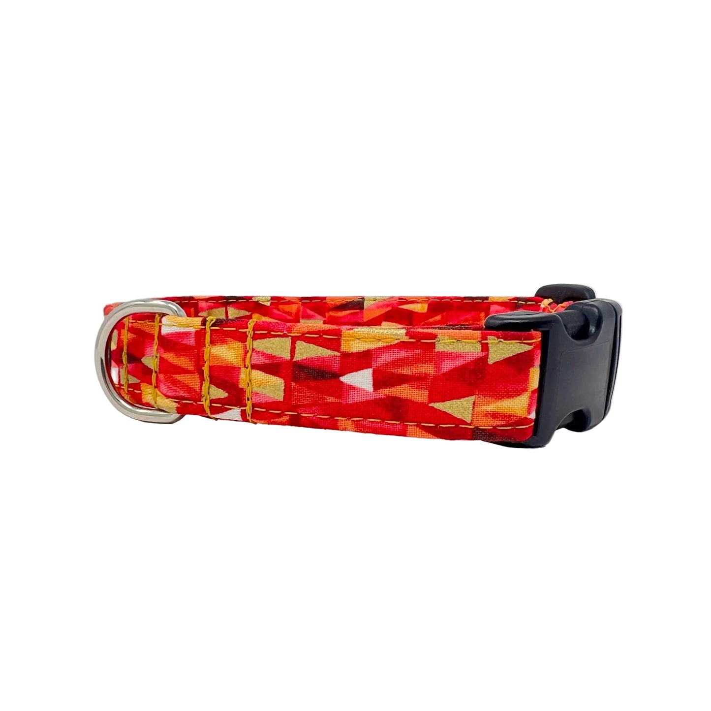 Fabric reinforced dog collar with a triangular pattern in shades of pinks and reds with gold metallic highlights