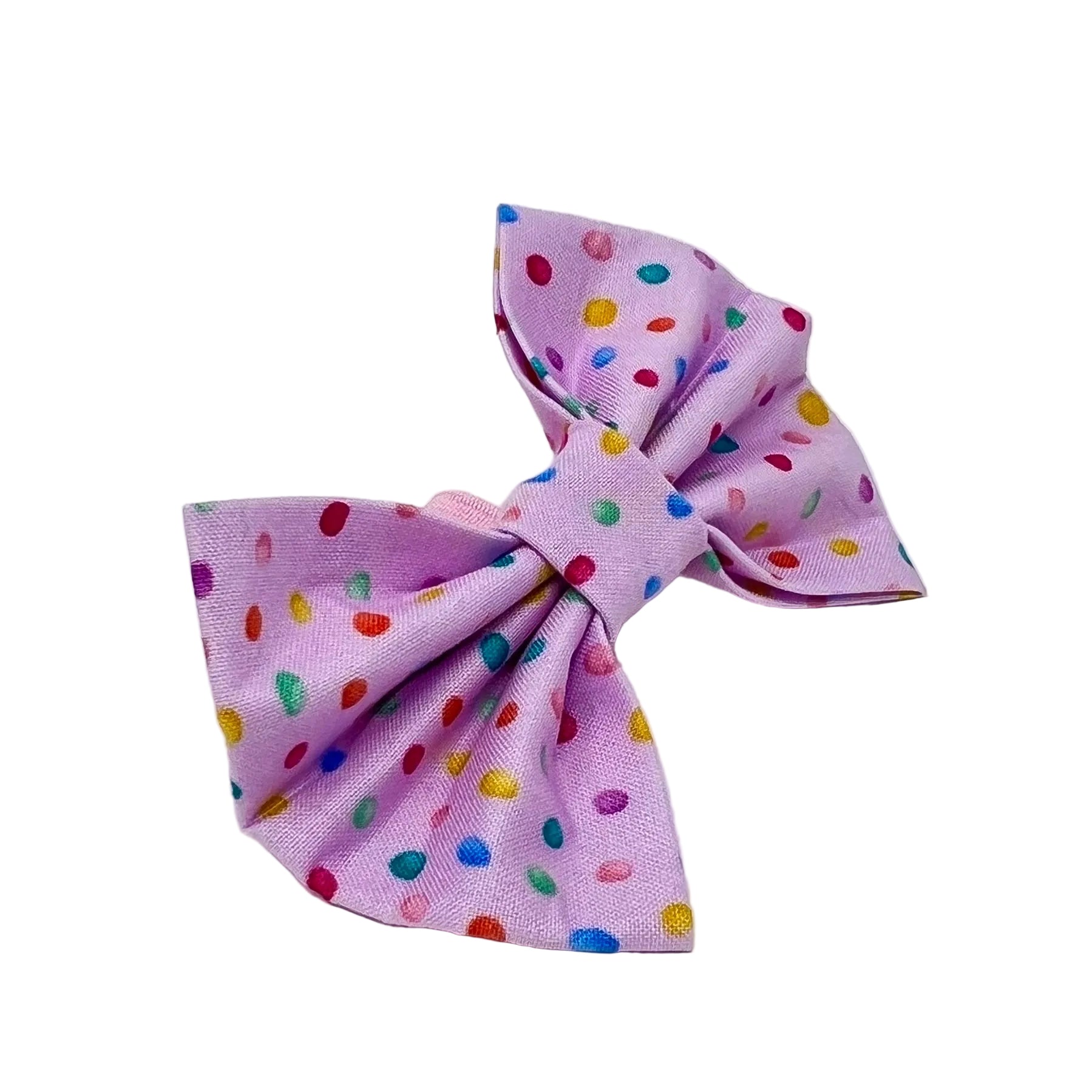 dog bow with  a pink back ground and tiny colourful rainbow bubbles scattered across it. feminine 