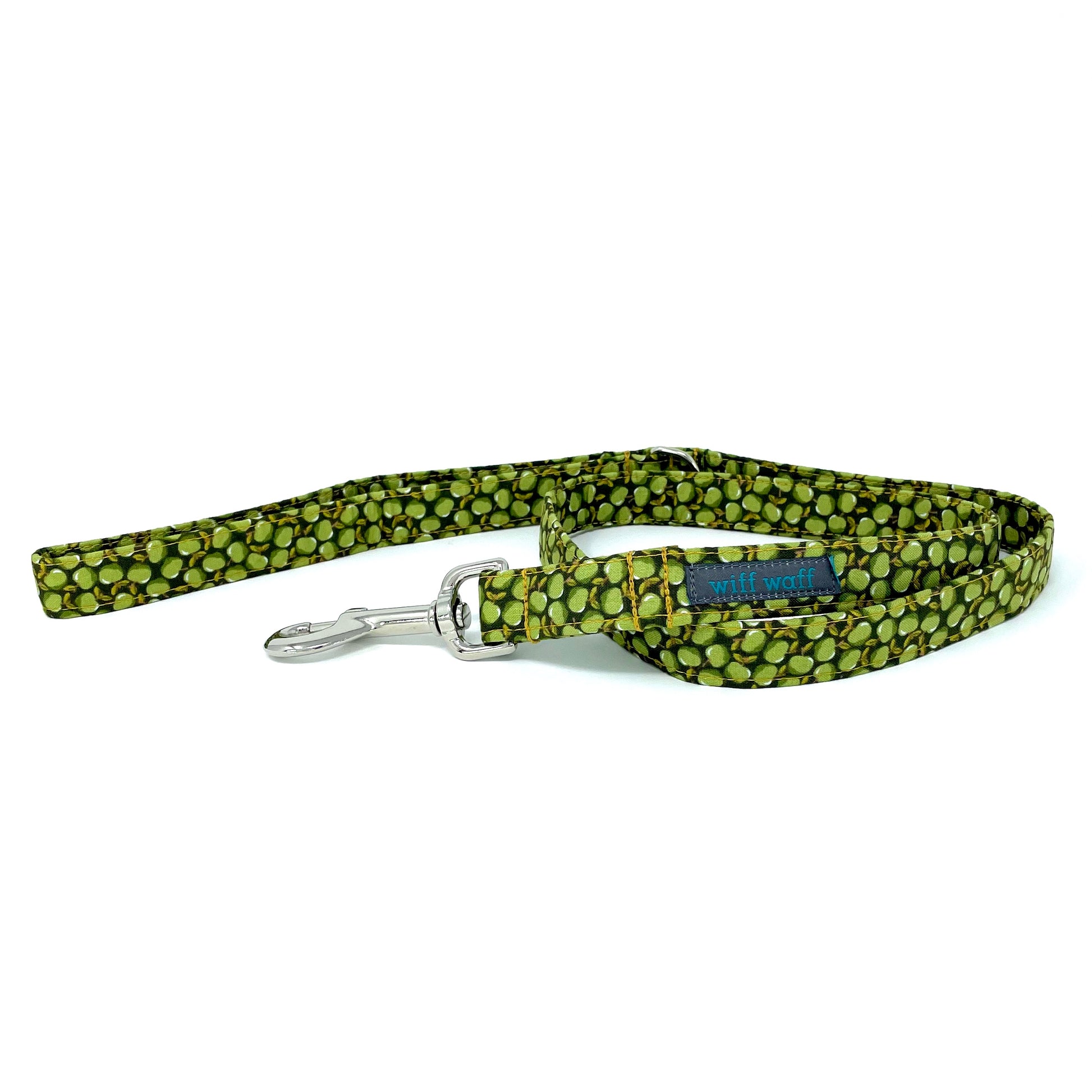 Green apple print dog lead with shiny chrome d ring and clip. Handcrafted by wiff waff designs.