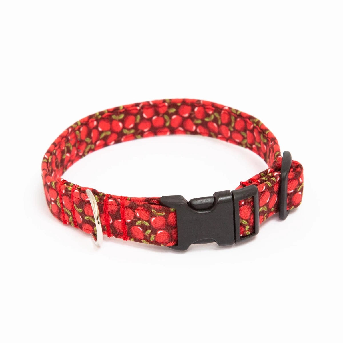Handcrafted dog collar by Wiff Waff Designs with red apple print fabric